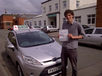 Proudly holding his Pass Certificate following a great drive. AUG 2012...