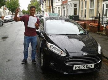 Manyongy Moliro clearly delighted holding his Pass Certificate after passing his test first time today, following in his brother´s high standards, who too passed first time with Salvina.  A fantastic drive in pouring rain with only 2 driver faults.  Really well done after struggling to fit lessons in recently.  Good luck with your driving in ...